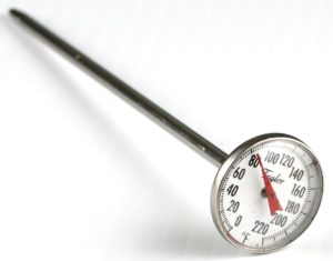 A thermometer holds the measurement of the temperature.